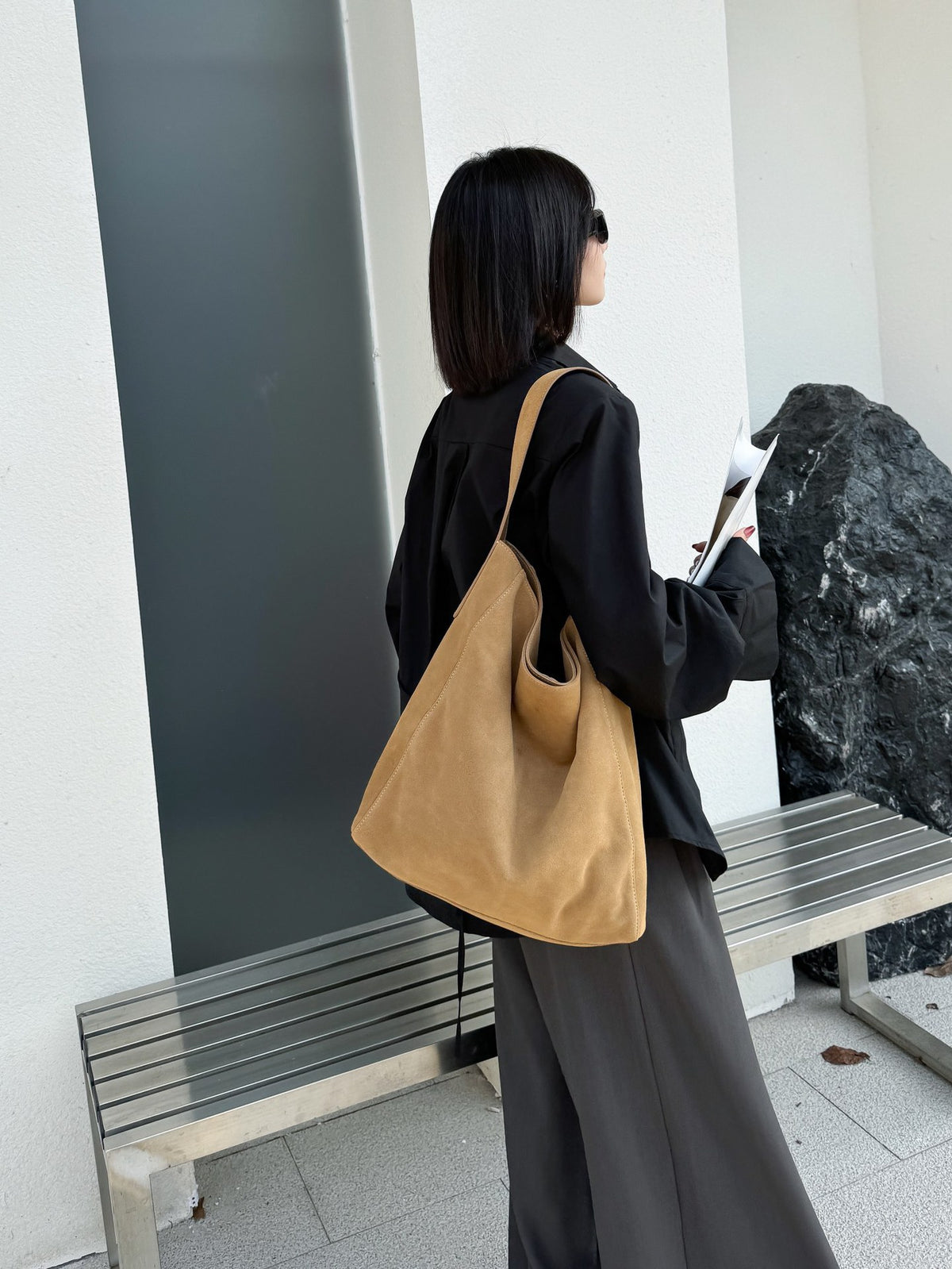 Full-length outfit with a large caramel tote
