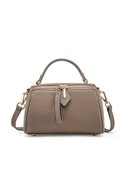 Gray mini Boston bag front view showing dual zip top and decorative leather pull