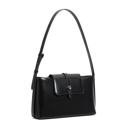 Black leather shoulder bag on white background