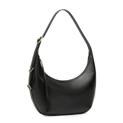 Black crescent leather bag on white background
