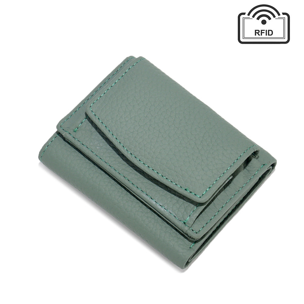Muted green cowhide wallet with matching stitched edges
