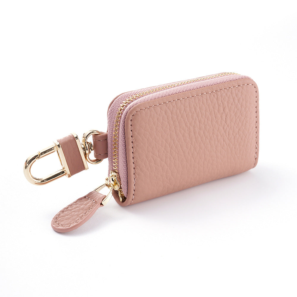 Light pink pebbled leather mini key pouch wallet with gold-tone zip pull