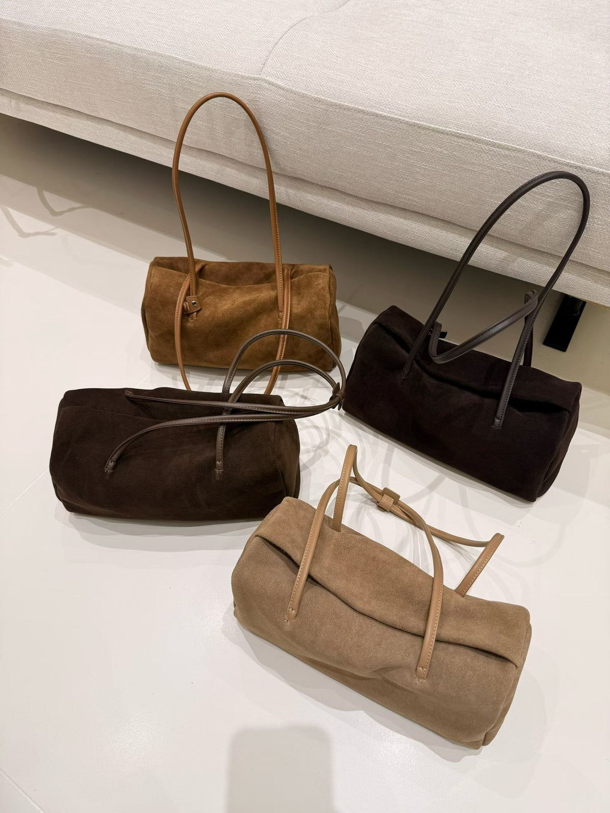 Multiple tote colors shown together from the front