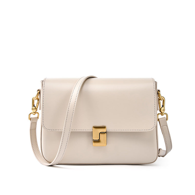 Cream cowhide leather crossbody bag with turn-lock front clasp