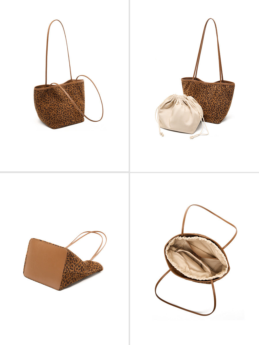 Bucket tote bottom and lined interior pocket details