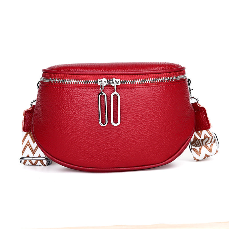 Red cowhide crossbody bag with patterned strap
