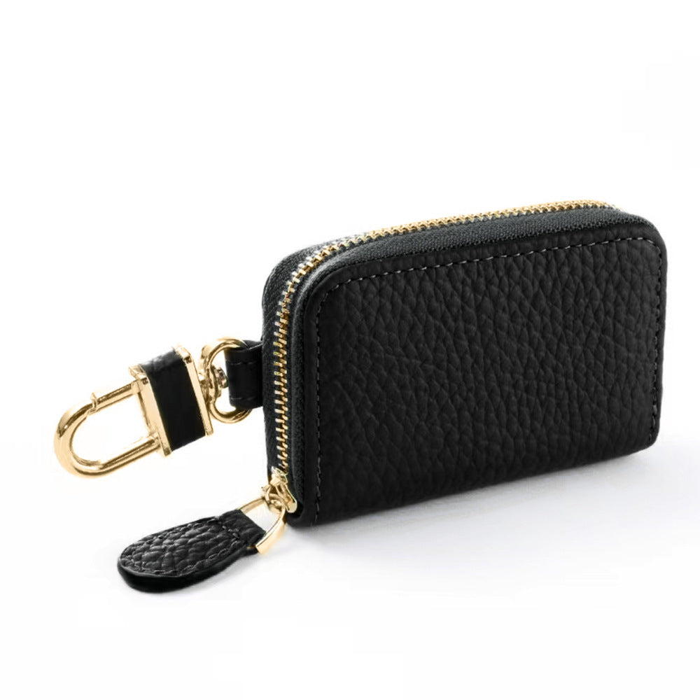 Black pebbled leather mini key pouch wallet with gold-tone zip and swivel clip
