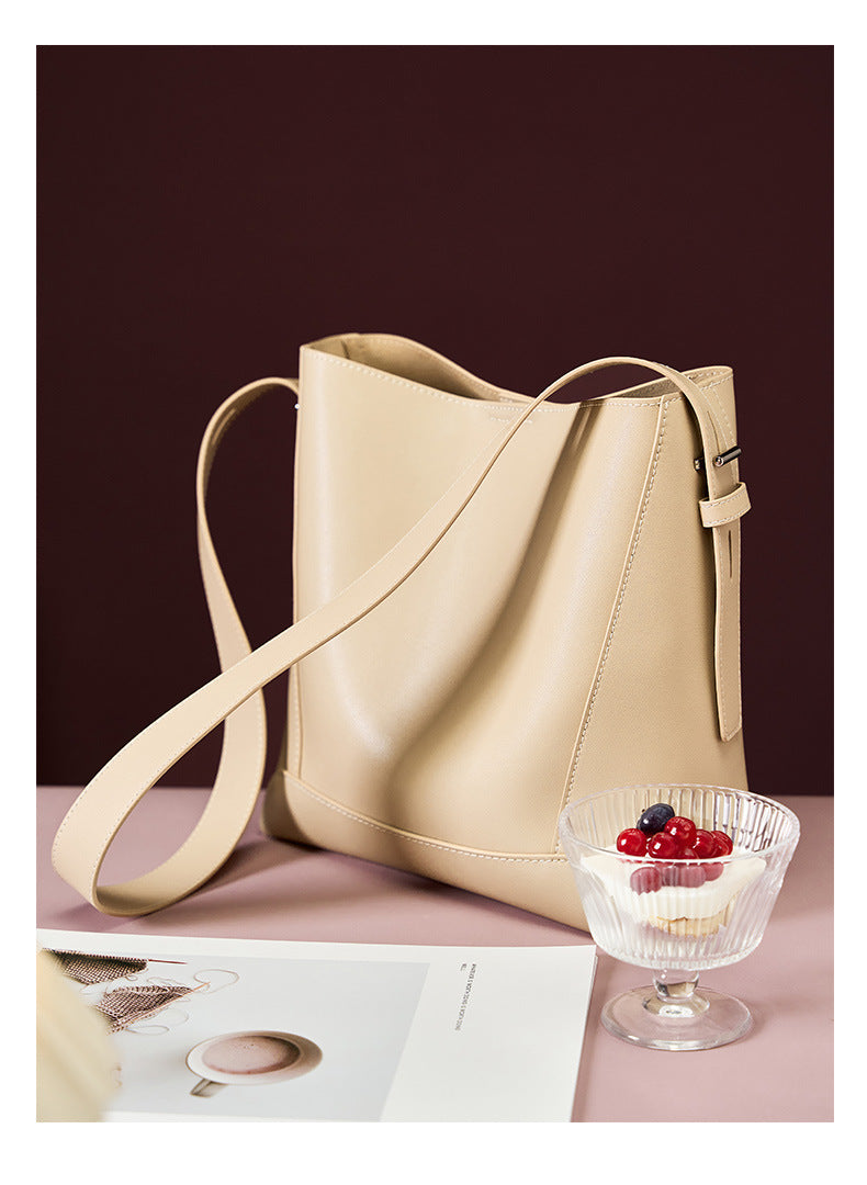 Salt Khaki bucket bag with fruit bowl on table