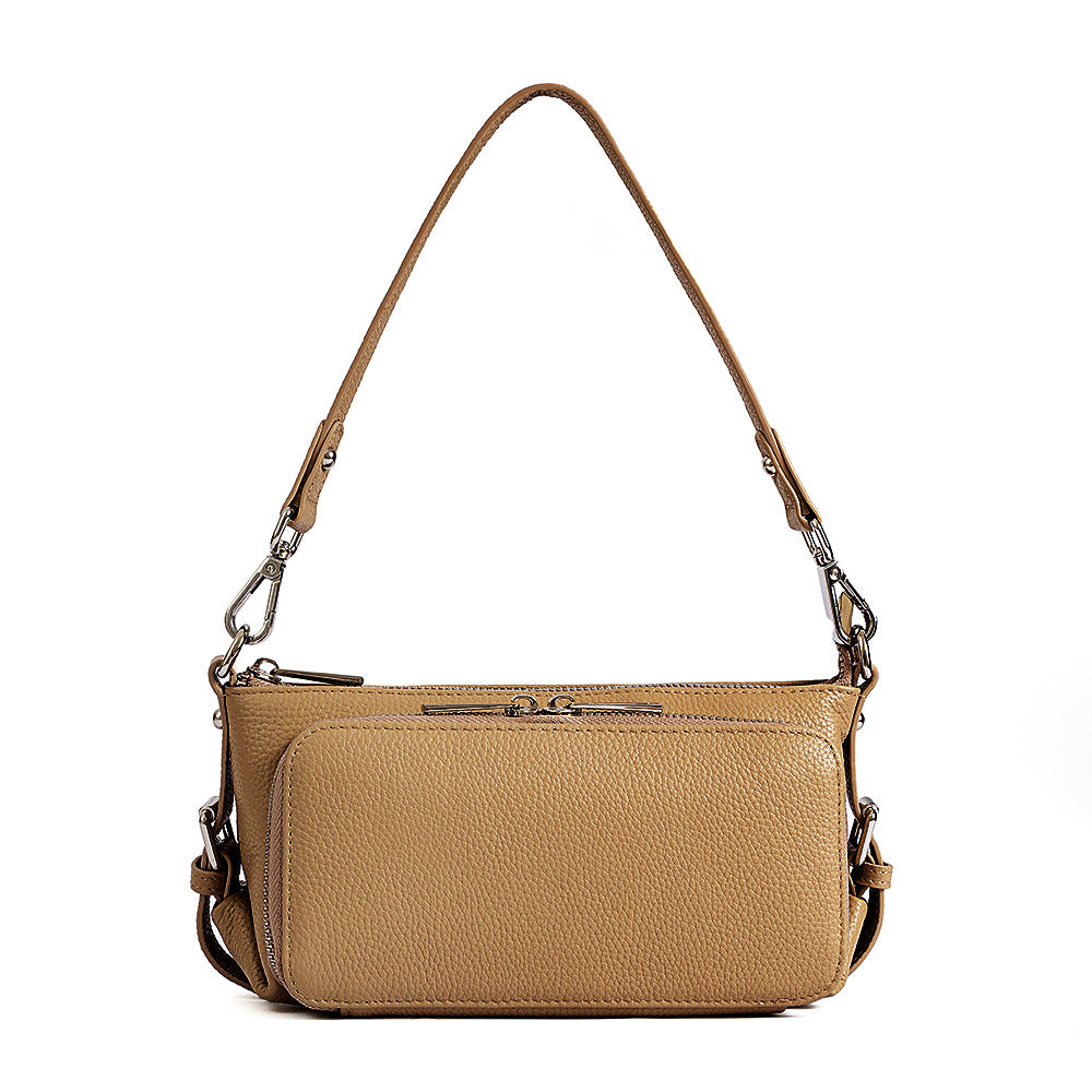 Coffee leather crossbody bag on white background