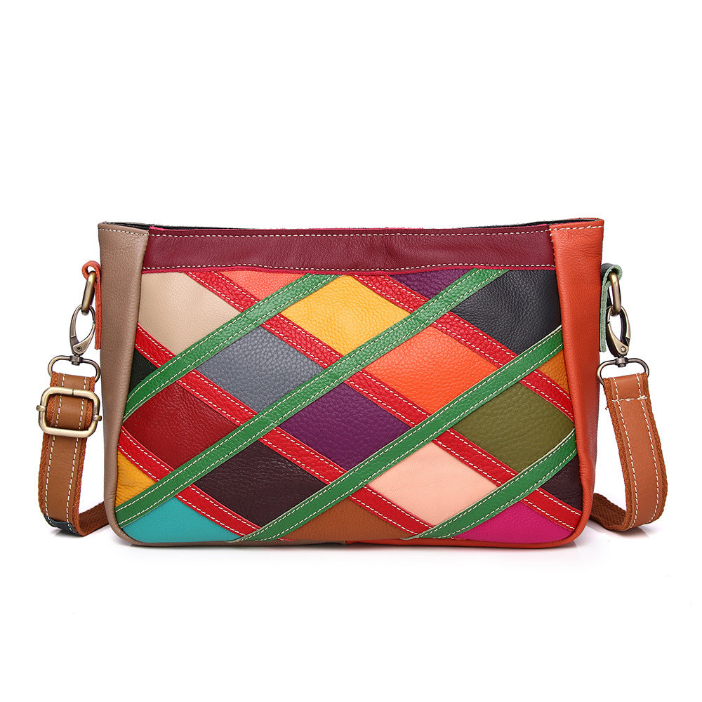 Front view of multicolor cowhide patchwork crossbody bag