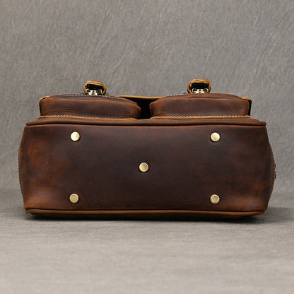Base view of dark brown bag with metal feet