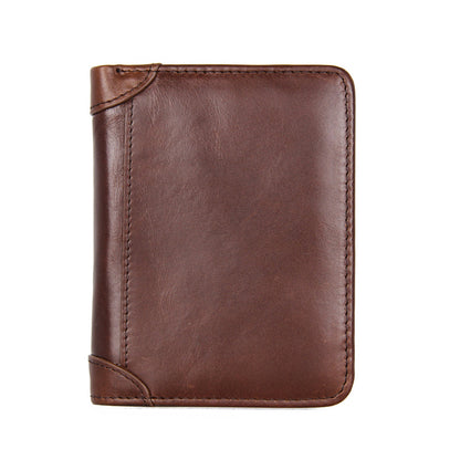 Brown cowhide leather bifold wallet displayed closed on a white background