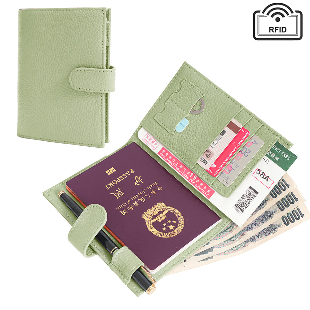 Coffee brown passport wallet close-up highlighting the pebbled leather texture and stitching detail