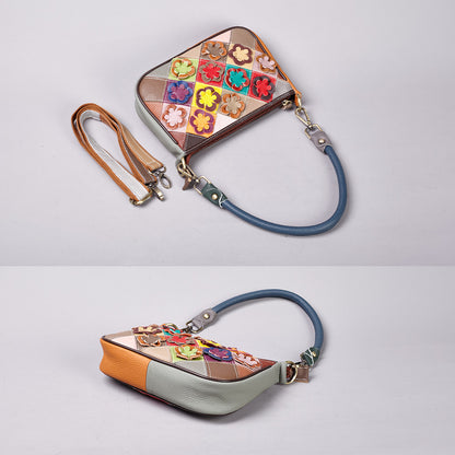 Crossbody bag shown from above with its straps arranged beside it
