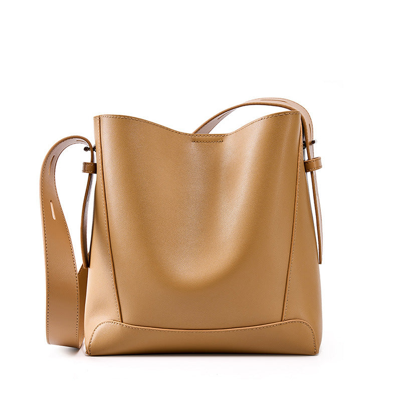Salt Khaki leather bucket bag on white background