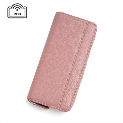 Light pink leather wallet with stitching on white background