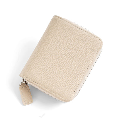 Ivory pebbled leather compact wallet with zip-around design