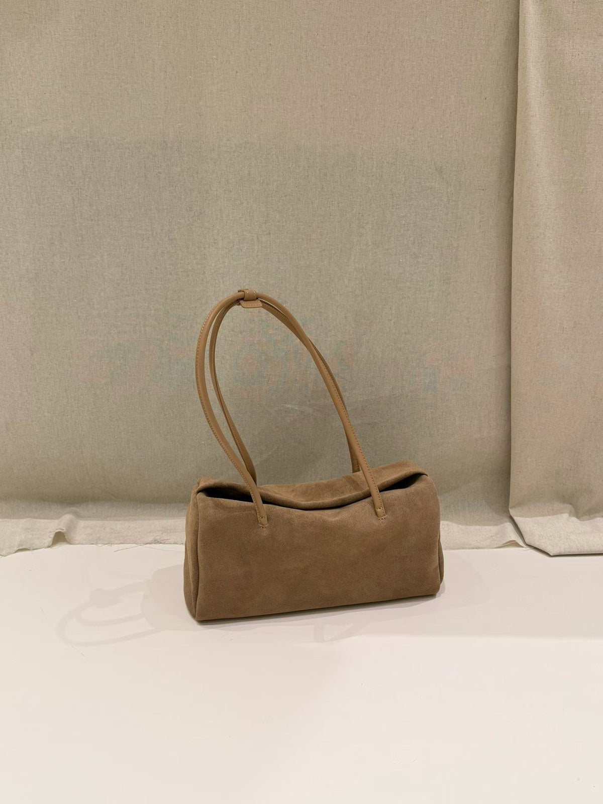 Interior view showing the tote's zip pocket and slip pocket