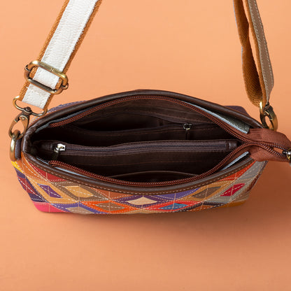 Open bag showing polyester lining and interior zip and slip pockets
