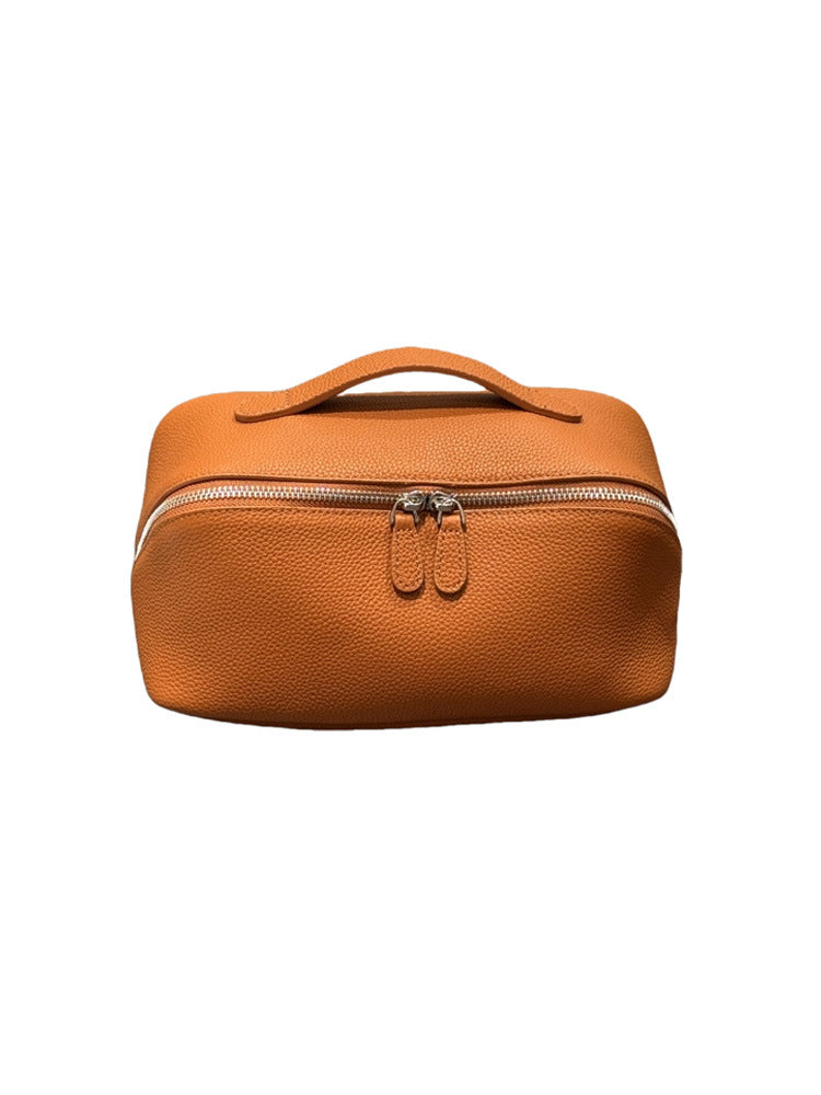 Back view of the textured orange-brown leather pouch
