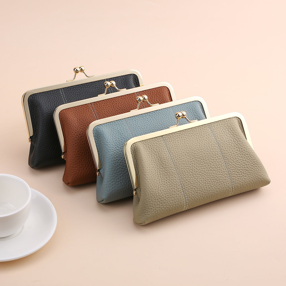 Four color options of the cowhide frame clutch