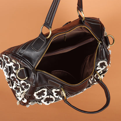 Open black and white Boston bag showing interior pockets