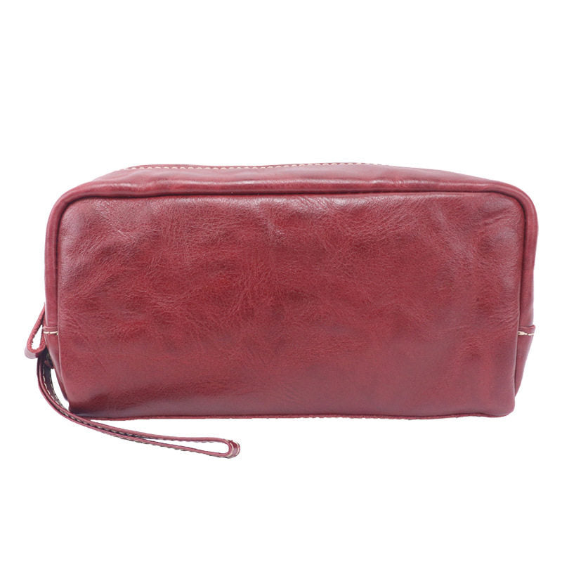Burgundy leather toiletry pouch shown from the front