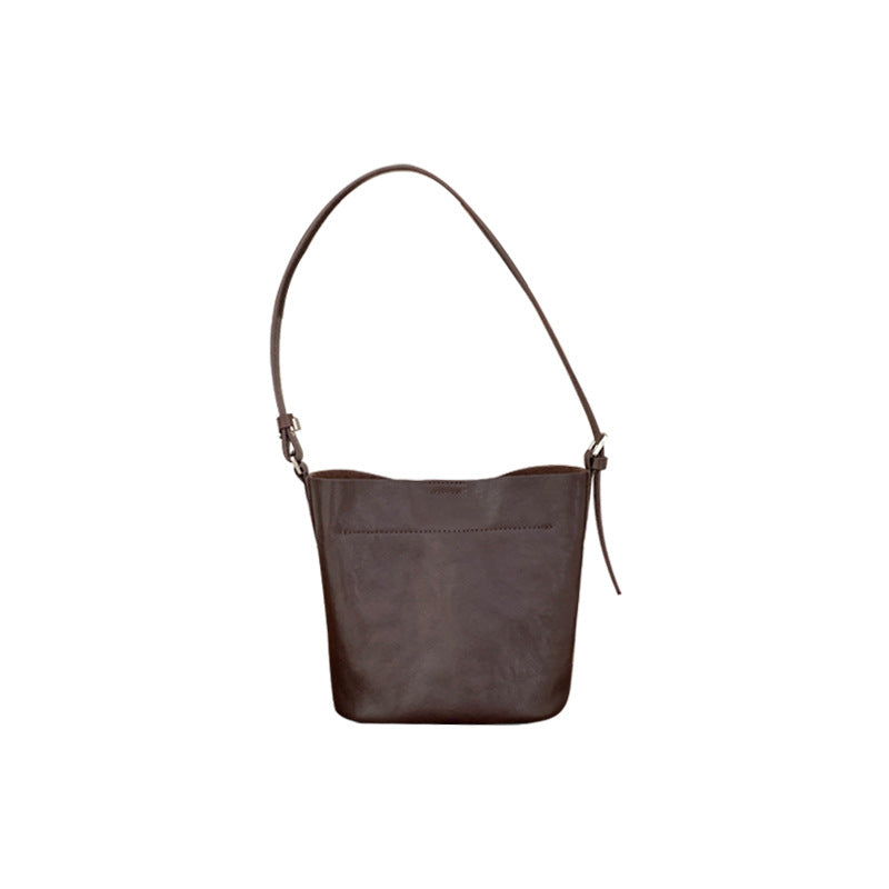 Soft bucket bag silhouette and long shoulder strap