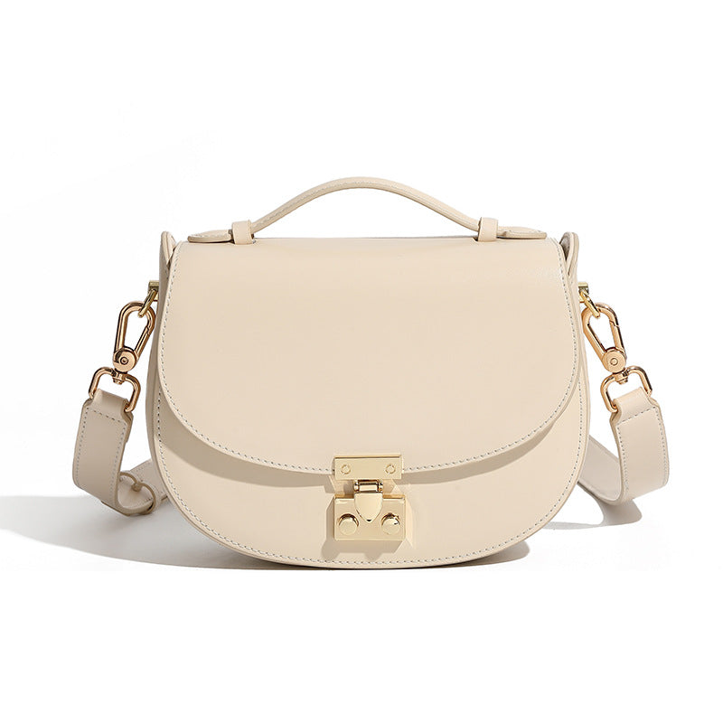 Cream cowhide leather mini saddle crossbody bag front view