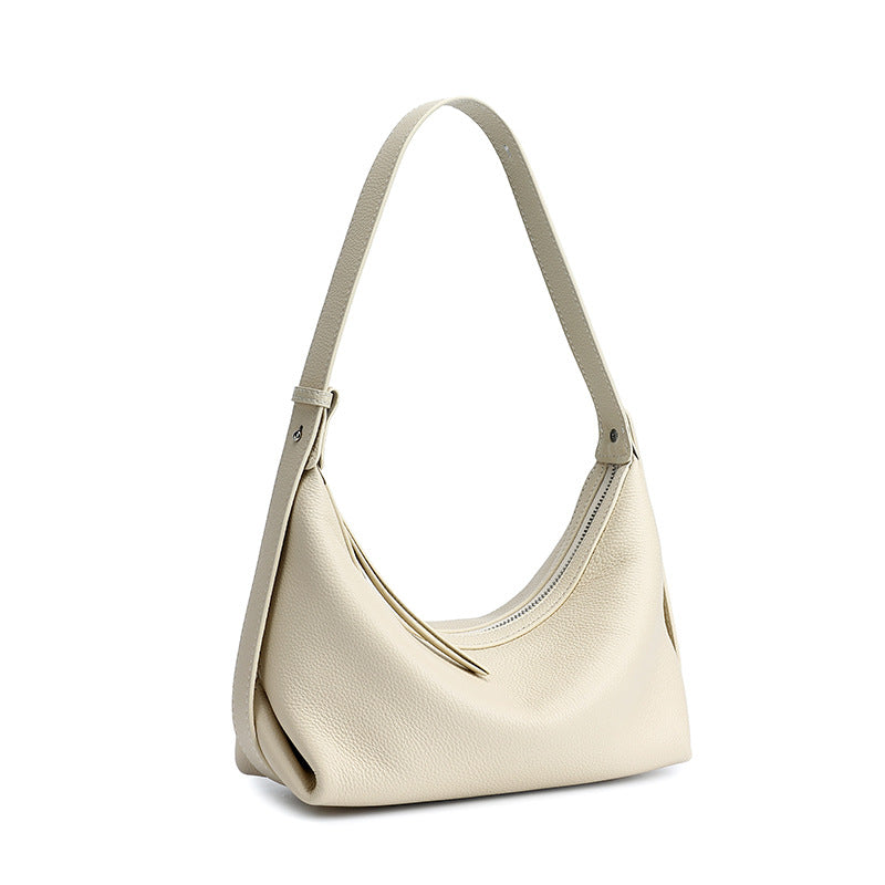 Ivory white leather hobo bag on white background