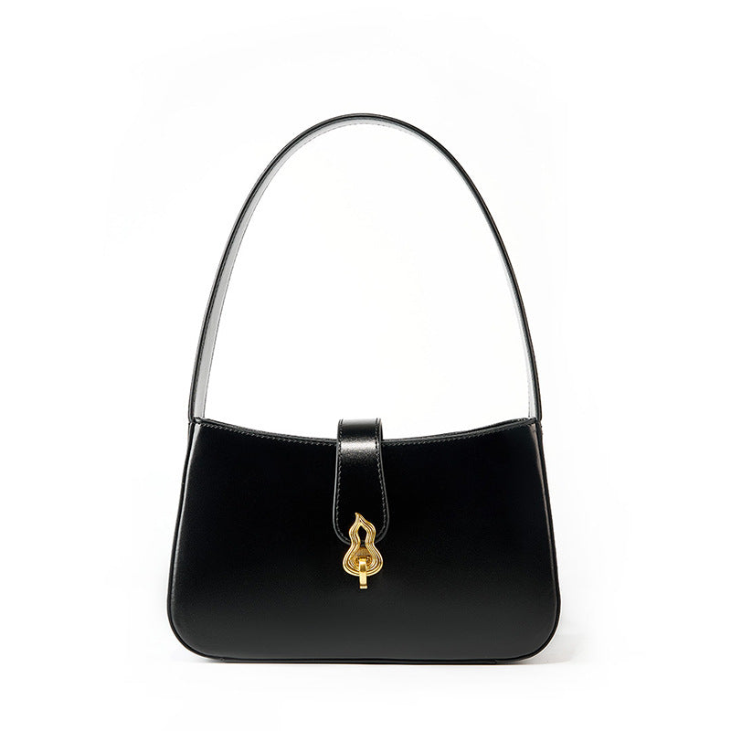 Black cowhide leather shoulder bag with gourd lock clasp on white background