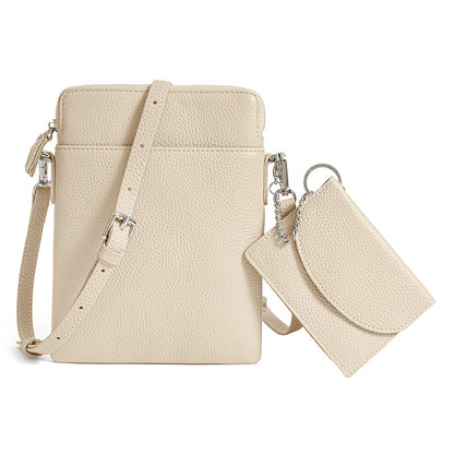 Off-white pebbled leather mini crossbody phone bag with matching detachable coin pouch on white background