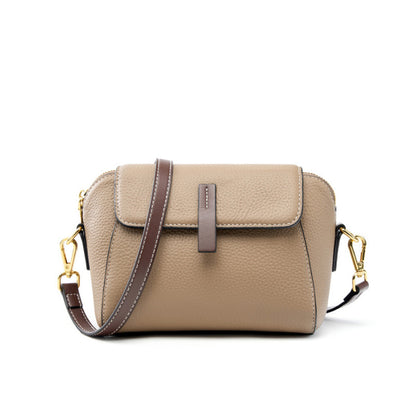 Khaki top-grain cowhide shell crossbody bag with brown leather pull tab and gold-tone hardware