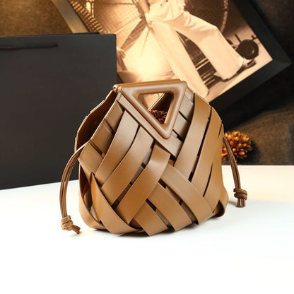 Brown woven bucket bag shown from the front