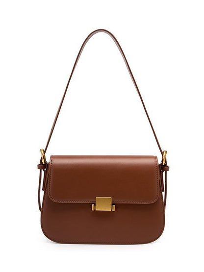 Caramel cowhide leather shoulder bag, full front view on white background