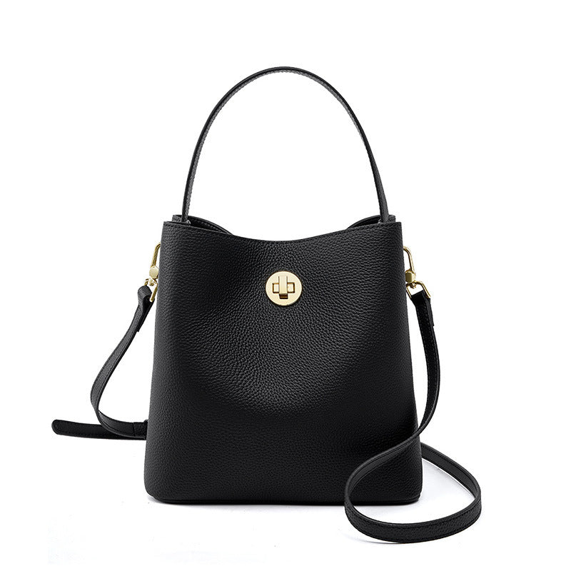 Black top-grain cowhide bucket bag with turn-lock closure front view