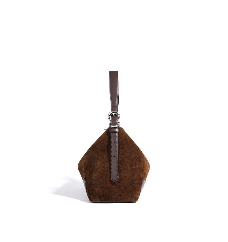Brown tote shown in a side profile