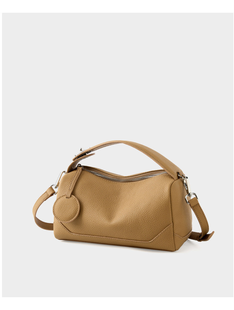 Caramel mini Boston bag front view on white background