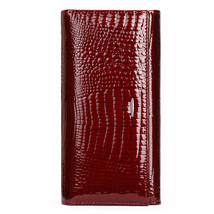 Burgundy textured cowhide wallet shown closed against a white background