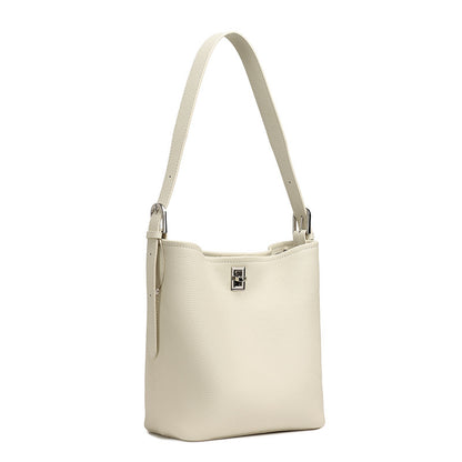 Off-white top-grain cowhide leather bucket bag on white background