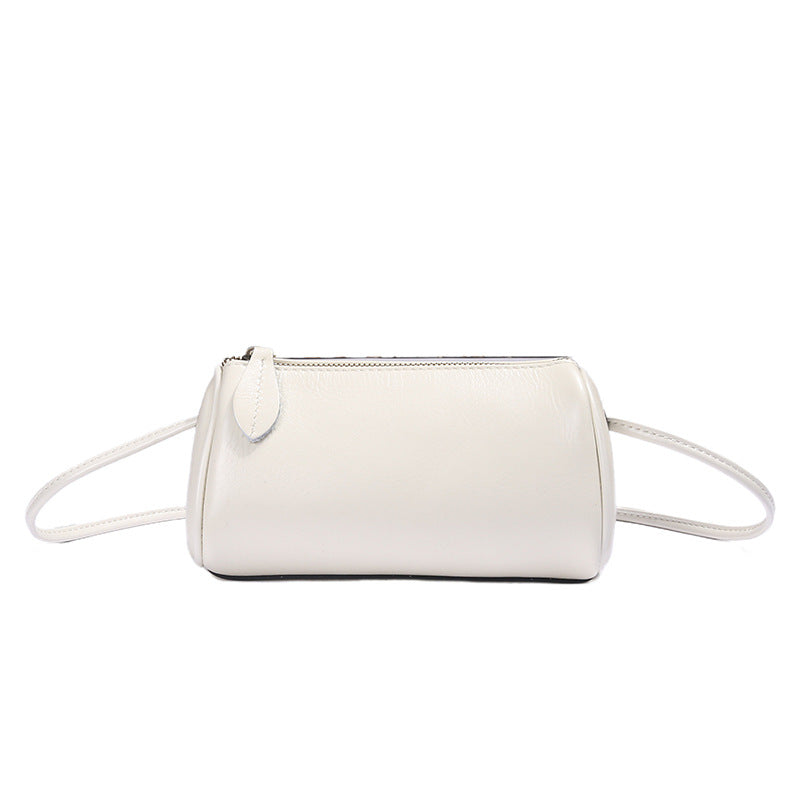 Emerald green cowhide mini barrel bag front view