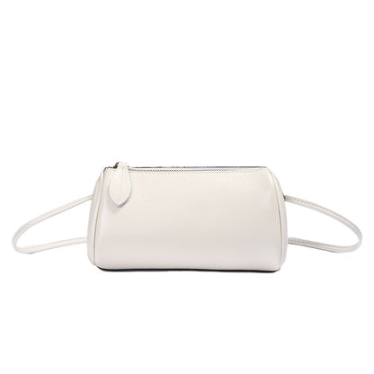 Emerald green cowhide mini barrel bag front view
