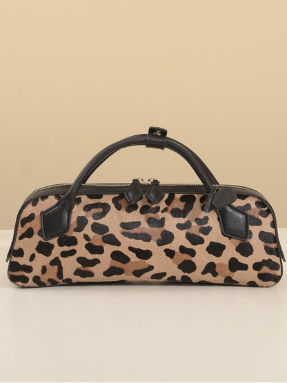 Front view of brown leopard-print cowhide shoulder bag with black top handles