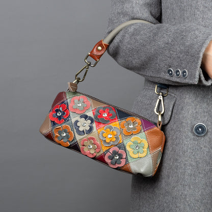 Flower patchwork bag shown worn over the shoulder