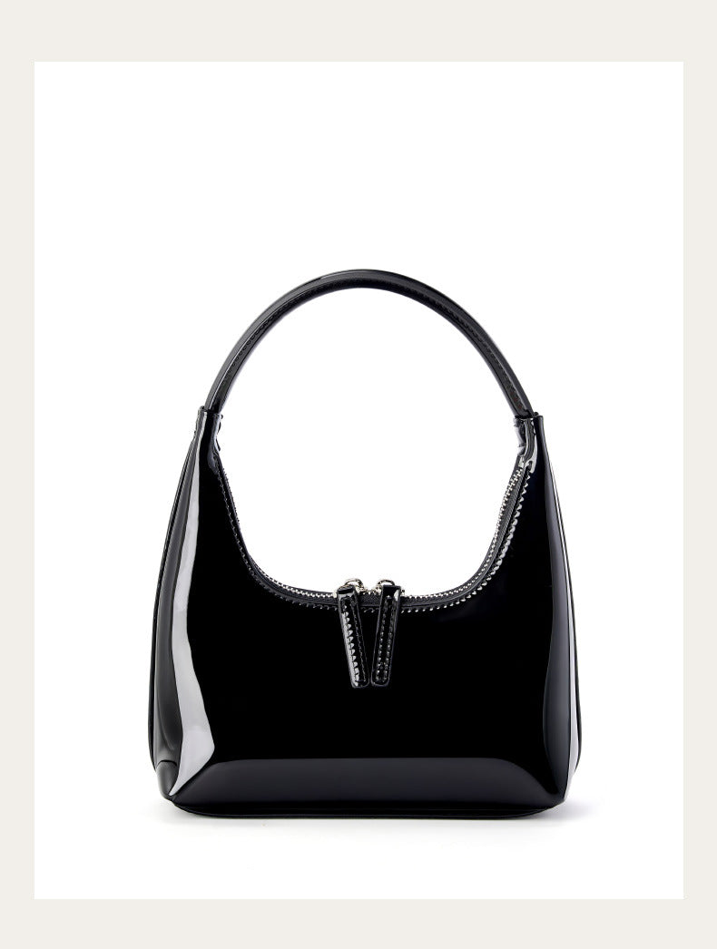 Black patent cowhide mini hobo bag, front view on white background