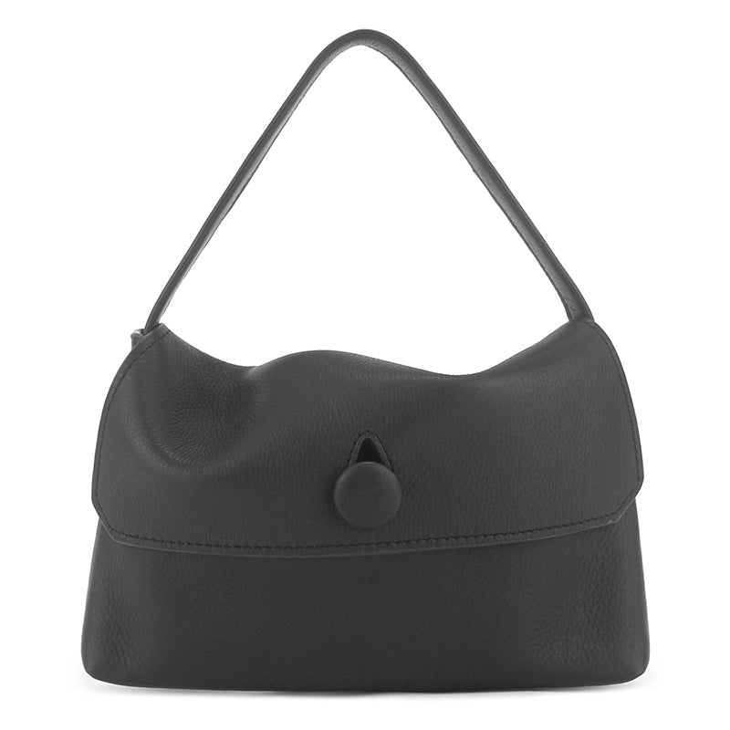 Black lambskin mini shoulder bag with button flap, front view