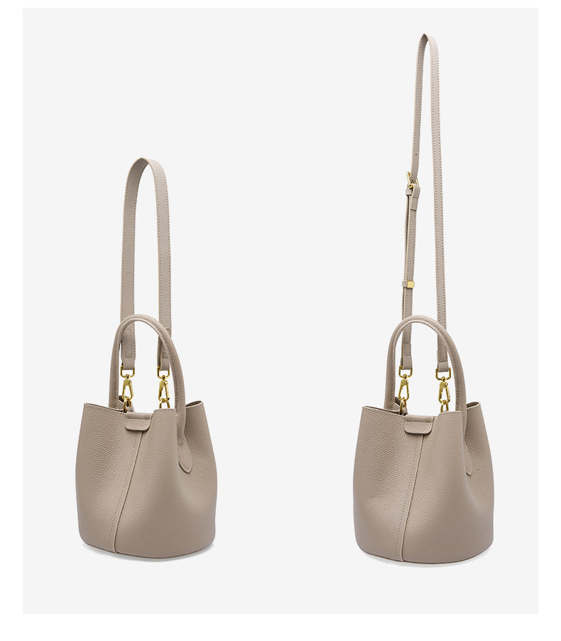 Two side views of bucket bag demonstrating short and long strap length
