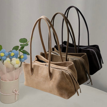 Three nubuck tote colors displayed together