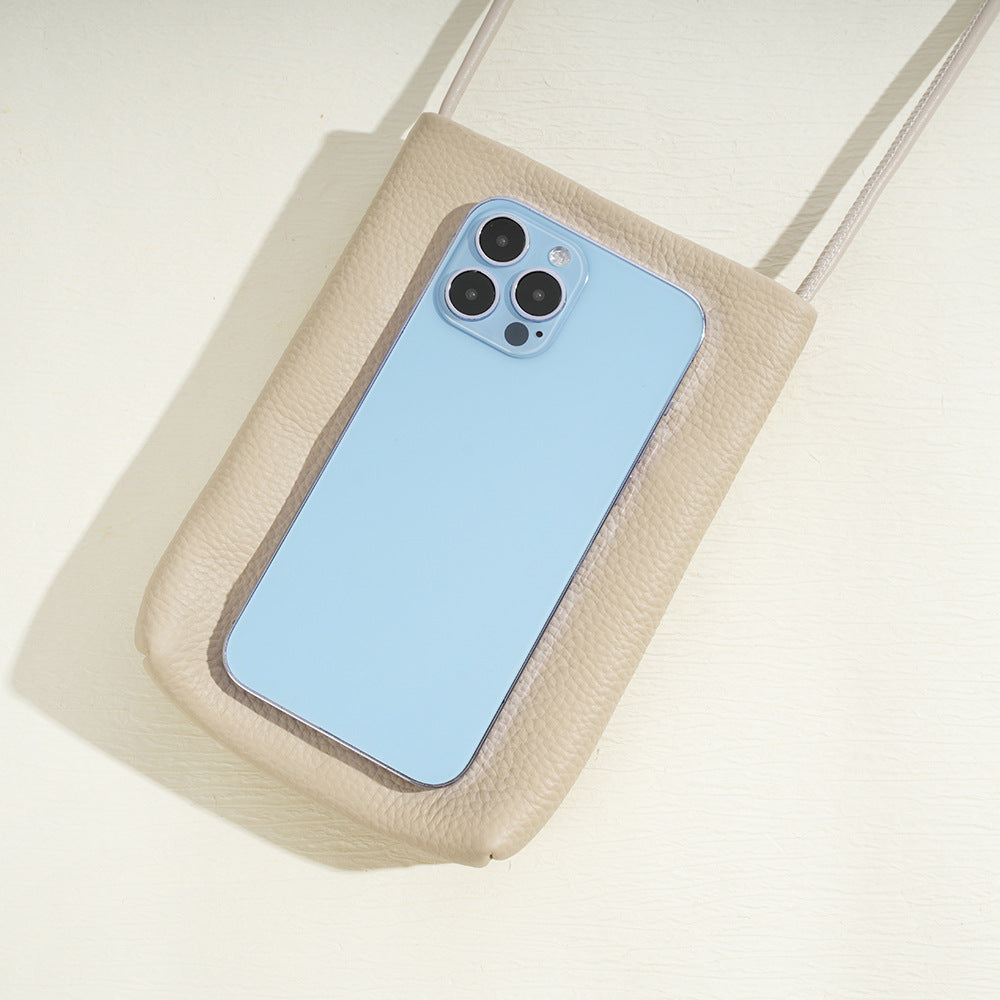 Light beige leather phone pouch with blue smartphone placed inside