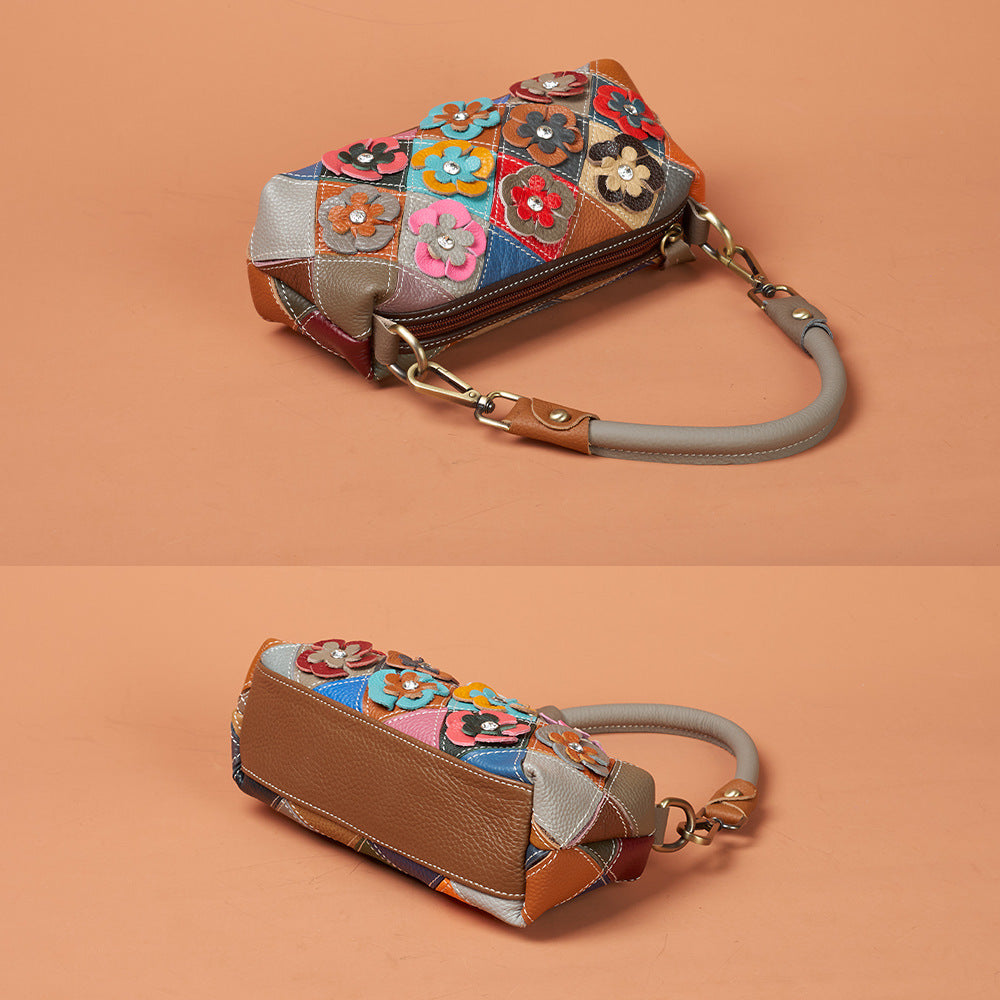 Back zip pocket and patchwork side view of cowhide bag